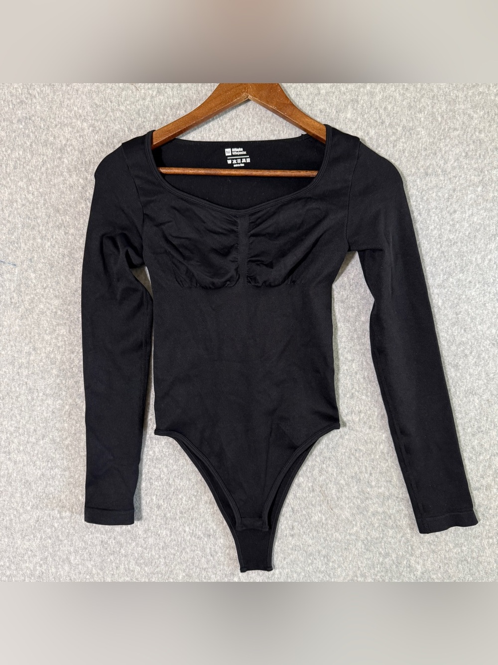 OQQ black, long sleeve rib, body shaping bodysuit size medium